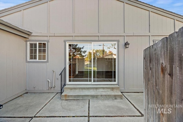 property entrance with a patio