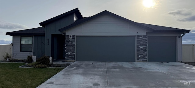 single story home featuring a garage