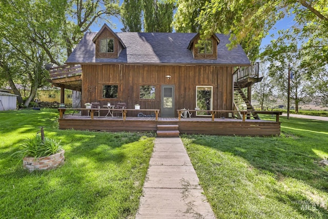 1011 E 1000 S, Albion, ID 83311 - view of front facade with a wooden deck, a front yard, and a shingled roof
