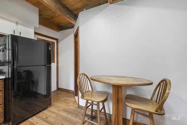 1011 E 1000 S, Albion, ID 83311 - dining space with wooden ceiling with exposed beams and light wood-type flooring
