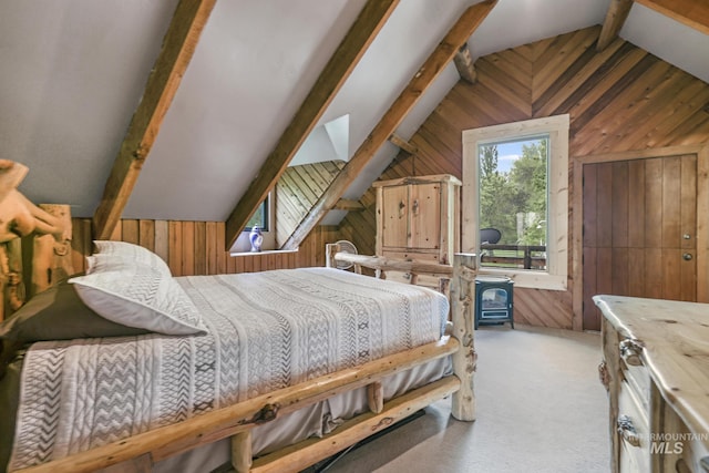 1011 E 1000 S, Albion, ID 83311 - carpeted bedroom featuring wooden walls and access to exterior