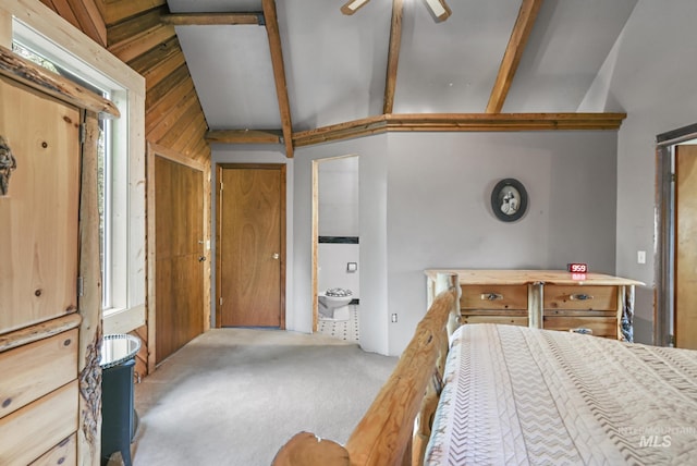 1011 E 1000 S, Albion, ID 83311 - bedroom with carpet flooring, wooden walls, and connected bathroom