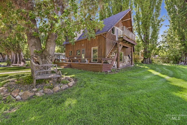 1011 E 1000 S, Albion, ID 83311 - rear view of property with a deck, a shingled roof, and stairs
