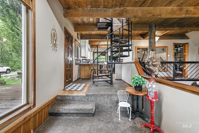 1011 E 1000 S, Albion, ID 83311 - stairs featuring wooden ceiling with exposed beams, carpet floors, and wainscoting