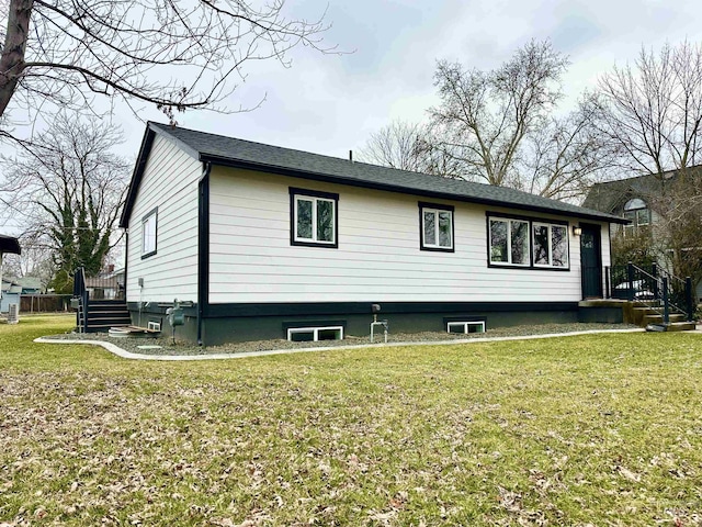 view of home's exterior featuring a lawn