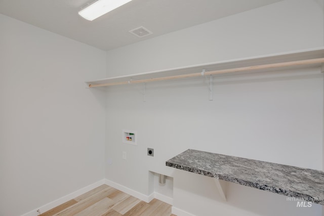 laundry room featuring light wood finished floors, visible vents, washer hookup, laundry area, and hookup for an electric dryer