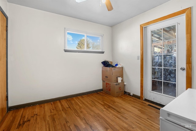 1817 Granada Dr, Twin Falls, ID 83301 - interior space with light wood finished floors, a healthy amount of sunlight, ceiling fan, and baseboards