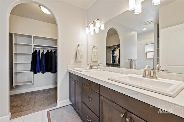 9753 W Wildbranch, Star, ID 83669 - bathroom featuring double vanity and a spacious closet