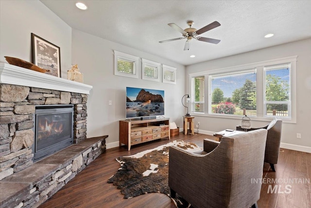 9753 W Wildbranch, Star, ID 83669 - living area featuring ceiling fan, wood finished floors, a fireplace, and recessed lighting