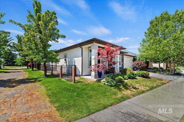 9753 W Wildbranch, Star, ID 83669 - view of front of house featuring an attached garage and stucco siding