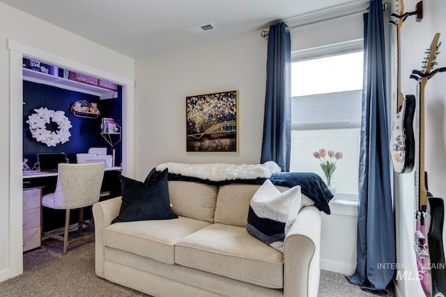 1987 S Defio Way, Meridian, ID 83642 - living room featuring carpet, healthy amount of natural light, and an office area