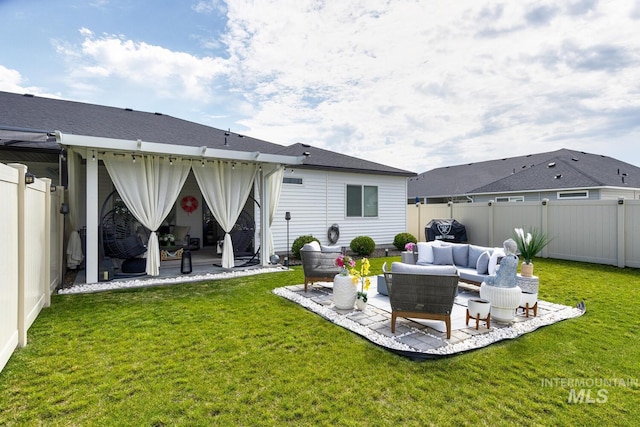 1987 S Defio Way, Meridian, ID 83642 - rear view of house featuring outdoor lounge area, a patio area, and a fenced backyard