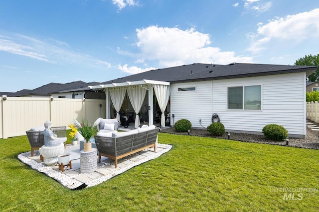 1987 S Defio Way, Meridian, ID 83642 - back of property featuring a patio area and an outdoor living space