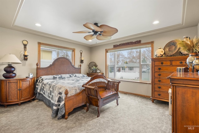 bedroom featuring ceiling fan and light colored carpet