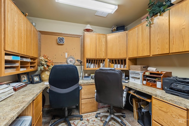 tiled office featuring built in desk