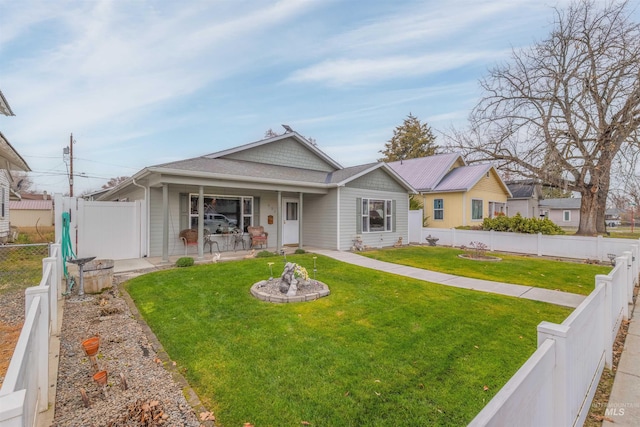 ranch-style house with a front lawn