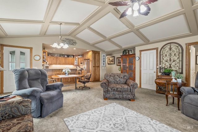 living room with light carpet, ceiling fan with notable chandelier, and lofted ceiling