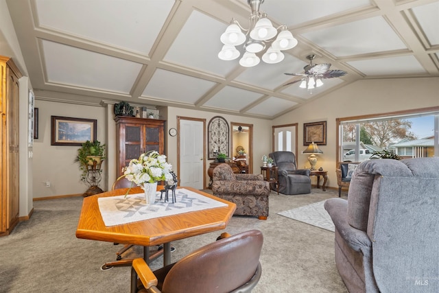 living room with ceiling fan with notable chandelier, light carpet, and vaulted ceiling