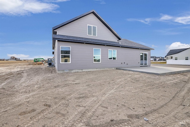 rear view of house with a patio