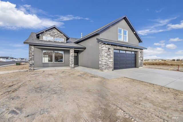 view of front of home with a garage