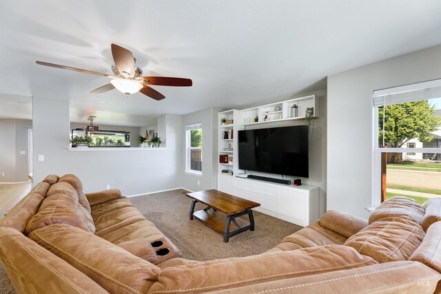 5375 N Isla Ave, Meridian, ID 83646 - carpeted living area with ceiling fan, plenty of natural light, and baseboards