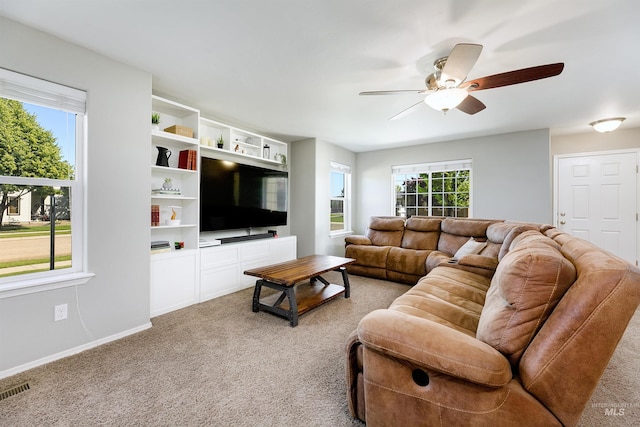 5375 N Isla Ave, Meridian, ID 83646 - living room with ceiling fan, light carpet, and baseboards