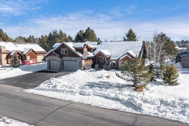 ranch-style home featuring a garage