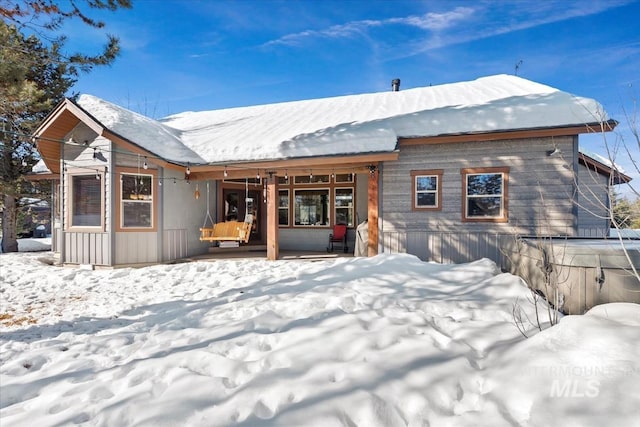 view of snow covered property