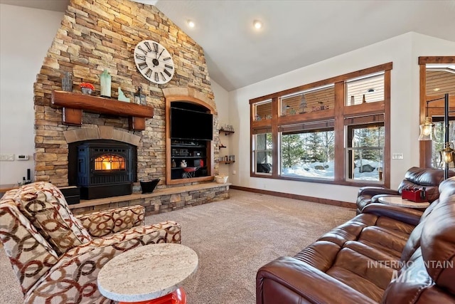 living room featuring a stone fireplace, high vaulted ceiling, and carpet