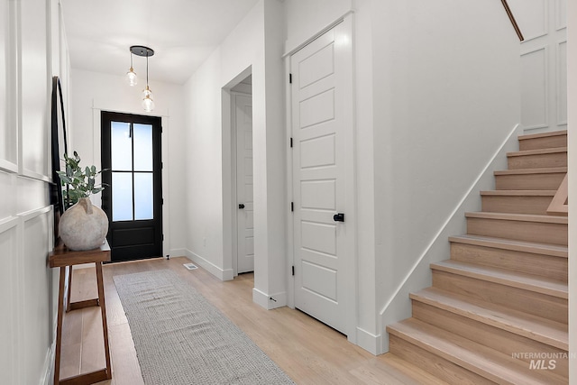 foyer featuring light hardwood / wood-style flooring