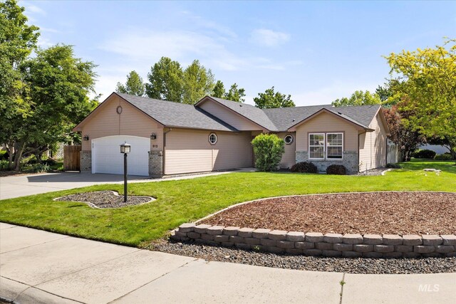 512 S Pelican Way, Meridian, ID 83642 - ranch-style house with driveway, an attached garage, a front lawn, brick siding, and roof with shingles