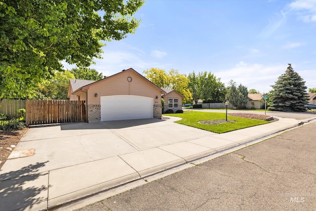 512 S Pelican Way, Meridian, ID 83642 - view of front of house with brick siding, an attached garage, and concrete driveway