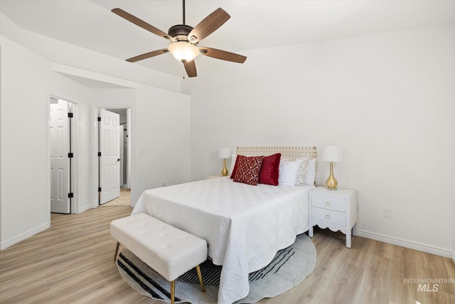 512 S Pelican Way, Meridian, ID 83642 - bedroom with light wood-style flooring, baseboards, and ceiling fan