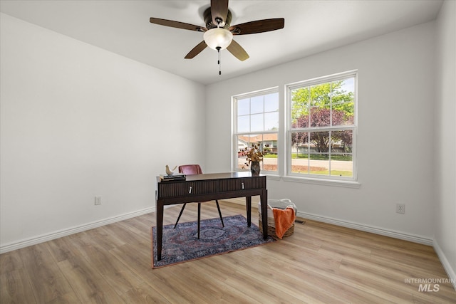 512 S Pelican Way, Meridian, ID 83642 - office area featuring light wood-style flooring, baseboards, and a ceiling fan