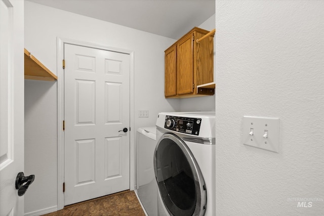 512 S Pelican Way, Meridian, ID 83642 - washroom featuring washing machine and clothes dryer and cabinet space