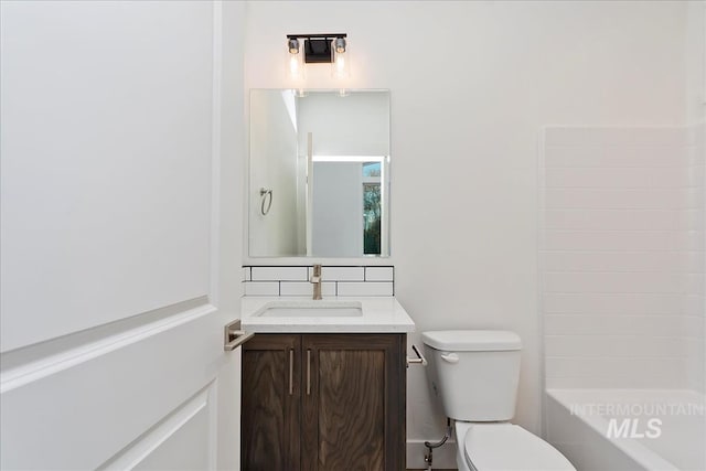 full bathroom with tasteful backsplash, shower / bathtub combination, vanity, and toilet