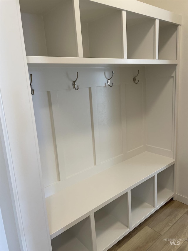 mudroom with wood finished floors