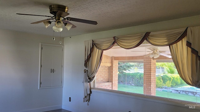 17 W 208 S, Burley, ID 83318 - spare room featuring a ceiling fan, baseboards, and a textured ceiling