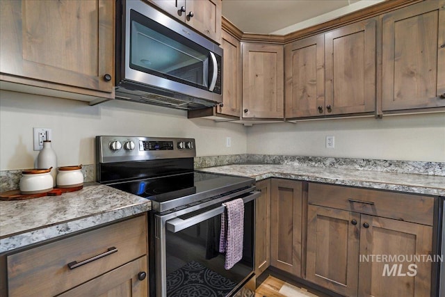 190 Bison Way, Fairfield, ID 83327 - kitchen featuring appliances with stainless steel finishes and light countertops