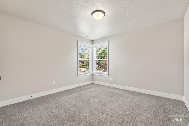 74 E Ranch Dr, Eagle, ID 83616 - spare room featuring carpet floors and a textured ceiling