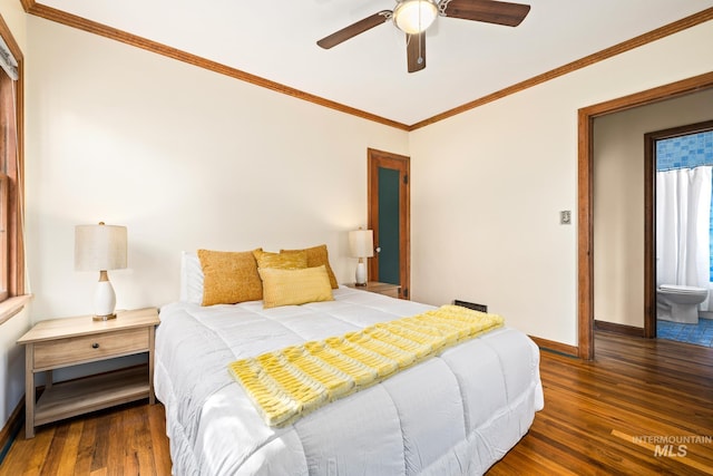 bedroom featuring dark hardwood / wood-style floors, ornamental molding, and ceiling fan