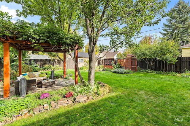 view of yard featuring an outdoor living space with a fire pit and a patio