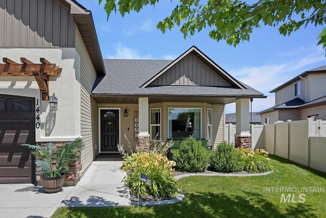 1440 Riverbend Pl, Twin Falls, ID 83301 - view of front of house with board and batten siding, a porch, and roof with shingles