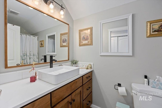 1440 Riverbend Pl, Twin Falls, ID 83301 - bathroom featuring vaulted ceiling and vanity