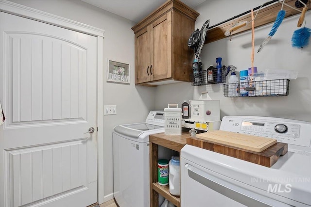 1440 Riverbend Pl, Twin Falls, ID 83301 - laundry area featuring washer and clothes dryer and cabinet space