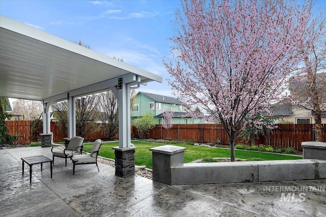 view of patio featuring a fenced backyard
