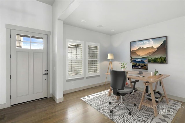 office space with hardwood / wood-style flooring