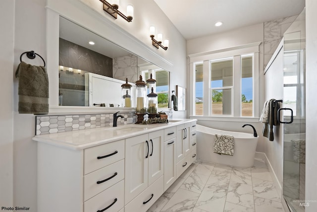 3053 Ajax Ave, Eagle, ID 83616 - full bathroom with double vanity, a soaking tub, decorative backsplash, a shower with shower door, and recessed lighting