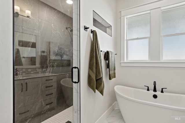 3053 Ajax Ave, Eagle, ID 83616 - bathroom featuring marble finish floors, a soaking tub, a stall shower, and baseboards