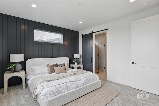 7779 W Daybreak Run Ct, Meridian, ID 83646 - bedroom with light colored carpet, a barn door, recessed lighting, and baseboards